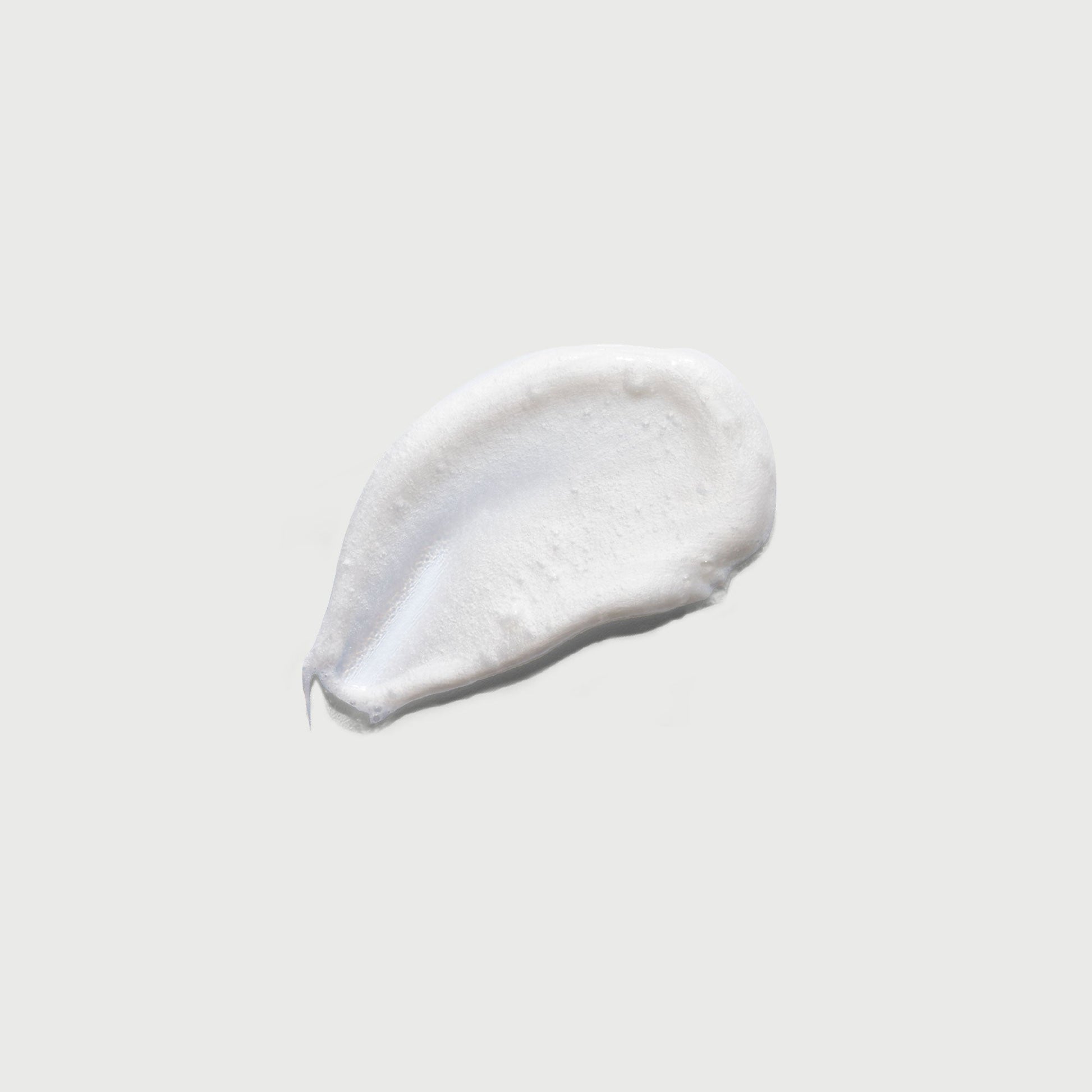 the-smoother-glycolic-acid-exfoliating-body-wash-v4 NATR-40002-Swatch-The-Smoother-Glycolic-Acid-Exfoliating-Body-Wash-bonebkgd.jpg