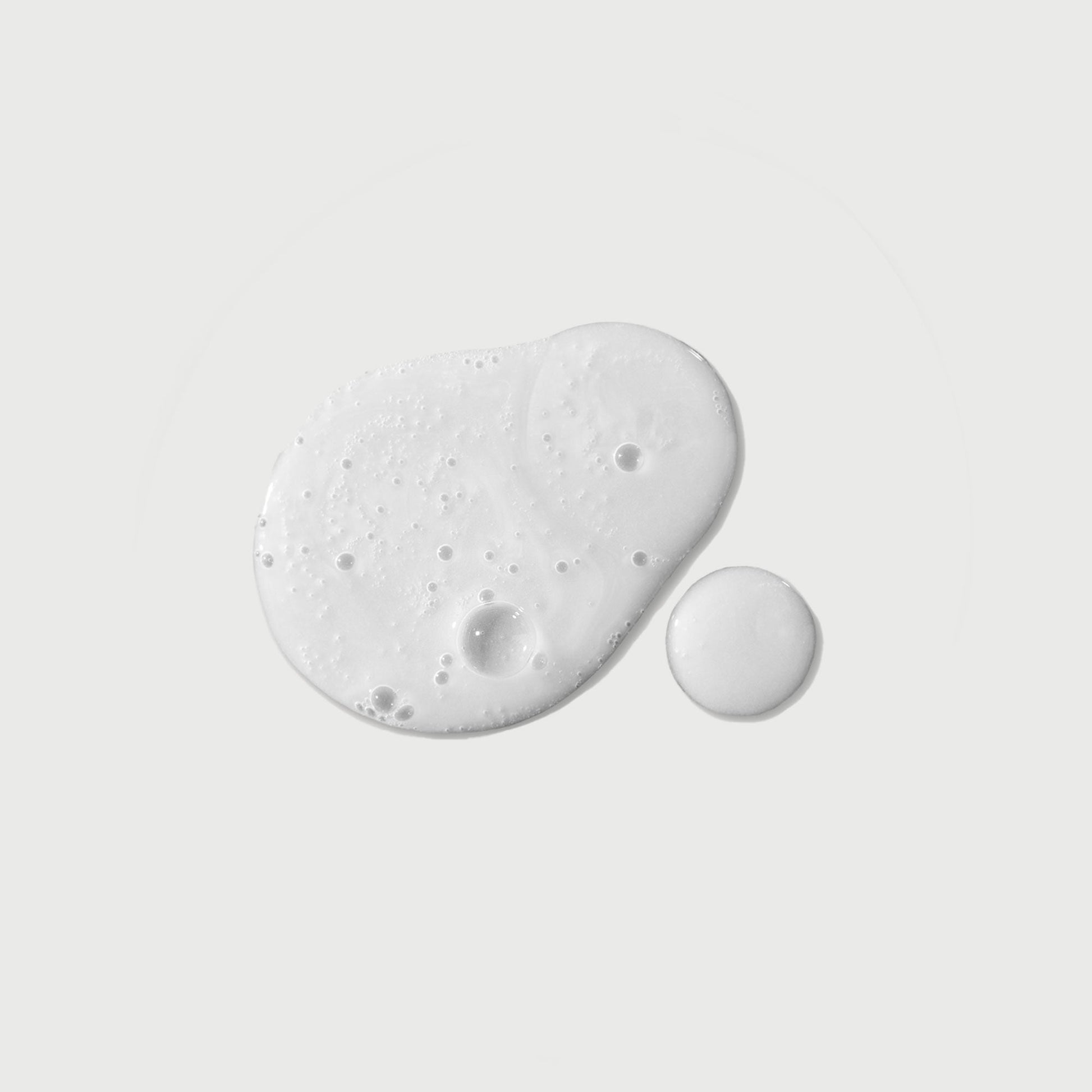 the-purifier-niacinamide-serum-body-wash-i4 NATR-40012-Swatch-The-Purifier-Niacinamide-Serum-Body-Wash-bonebkgd.jpg