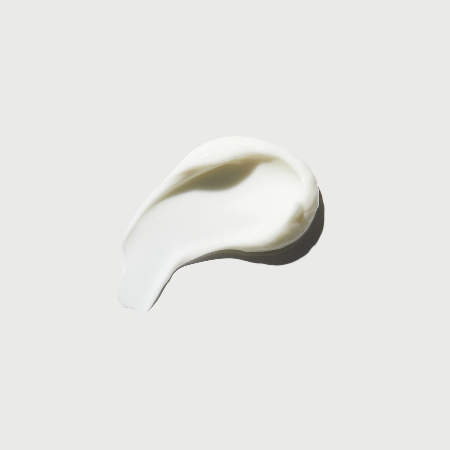 the-smoother-glycolic-acid-body-lotion-k0 NATR-40014-Swatch-The-Smoother-Glycolic-Acid-Body-Lotion-bonebkgd.jpg