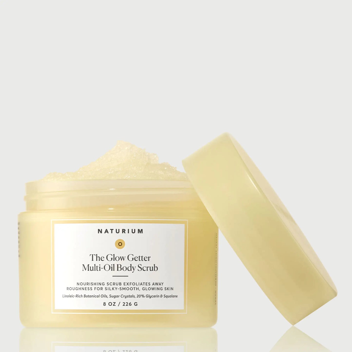 the-glow-getter-multi-oil-body-scrub-c6 NATR-40028-GlowGetter-Multi-Oil-Body-Scrub-Front-CapOff-bonebkgd.webp