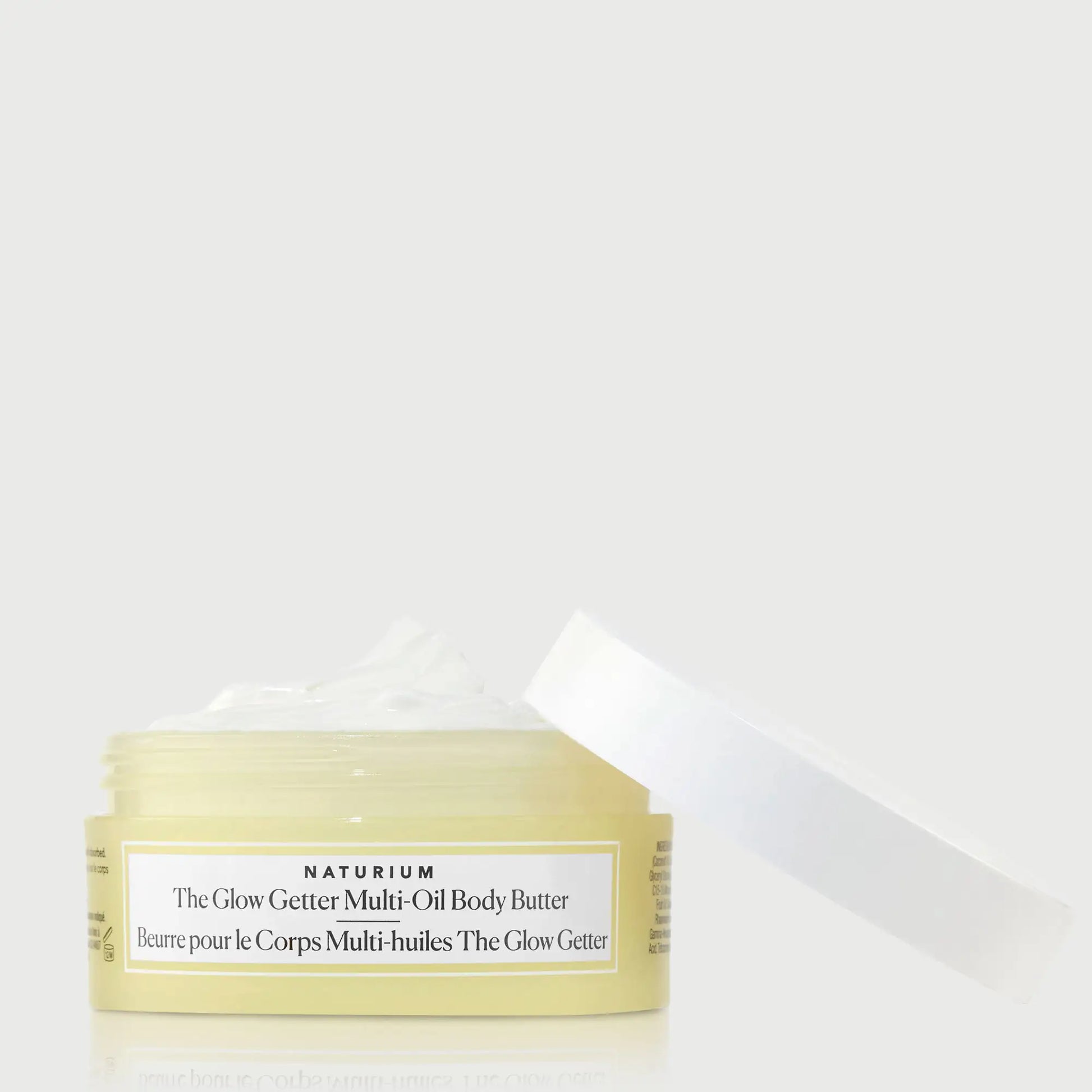 the-glow-getter-multi-oil-body-butter-travel-size-k8 NATR-40115_Glow-Getter-Body-Butter-Mini_front_capoff_bonebkgd.webp